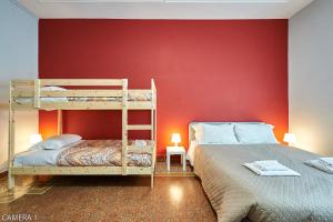 Un pat sau paturi într-o cameră la Casa a San Giovanni