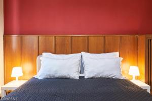 Un pat sau paturi într-o cameră la Casa a San Giovanni