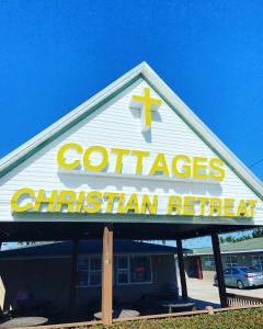 a sign for a christian restaurant on a building at Cottages Christian Retreat in Panama City Beach