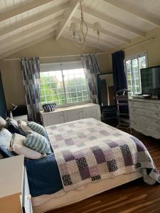 Postel nebo postele na pokoji v ubytování Casa grande con pileta zona B. los Troncos/Playa chica