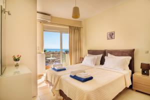 Posteľ alebo postele v izbe v ubytovaní Crete View