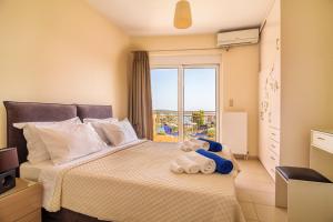 Posteľ alebo postele v izbe v ubytovaní Crete View