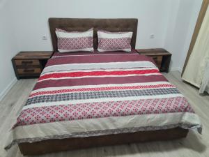 Un pat sau paturi într-o cameră la Apartament Ghencea Residence 158 Floor 4