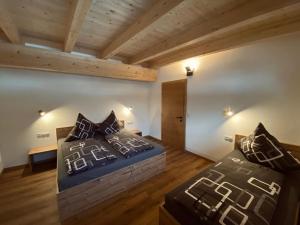 Posteľ alebo postele v izbe v ubytovaní Alpenliebe Pitztal
