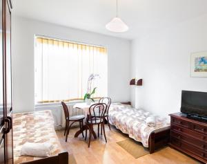 Telewizja i/lub zestaw kina domowego w obiekcie Hotel Monttis
