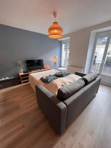 Posteľ alebo postele v izbe v ubytovaní Bel appartement T3 au 1er étage avec cour intérieure au RDC - Villa Marie