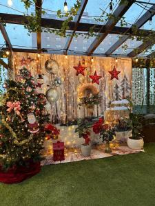 a christmas display with christmas trees and christmas decorations at Madison LES Hotel in New York
