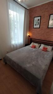 Кровать или кровати в номере Lviv Meretyna Apartment (між центром і вокзалом)