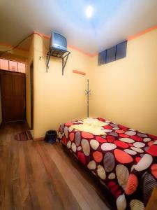 Katil atau katil-katil dalam bilik di HOSTAL Luz YHOBIMAR