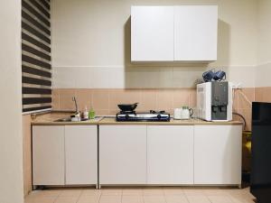 Kuchyň nebo kuchyňský kout v ubytování WiseDecision homeStay