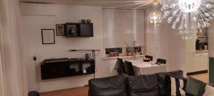 a living room with a couch and a table at Bij Paul in Almere in Almere