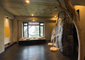 Postel nebo postele na pokoji v ubytování Zephyr Homestay