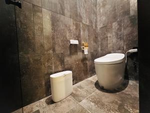 Koupelna v ubytování Zephyr Homestay