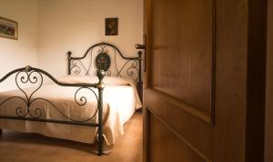Postel nebo postele na pokoji v ubytování Agriturismo Podere Valdo