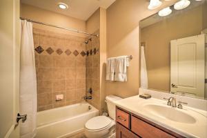 a bathroom with a sink and a toilet and a shower at Luxury Estate Private Hot Tub and Pickleball Court in Wake Forest +37 photos