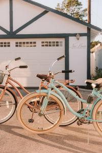 three bikes parked in front of a garage at New Haven Inn in Solvang +37 photos