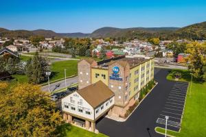 an aerial view of a town with a building at Best Western Lock Haven in Lock Haven