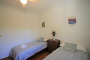 Łóżko lub łóżka w pokoju w obiekcie Chalet CasaTuris en Urb. La Font Sant Joan d´Alacant CH102