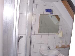Koupelna v ubytování Hotel Garni Löhr