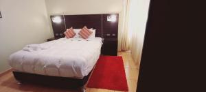 Hotel Mantas Cusco客房内的一张或多张床位