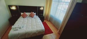Hotel Mantas Cusco客房内的一张或多张床位