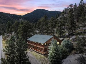 an aerial view of a house in the mountains at Pine Haven Resort in Estes Park