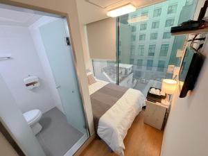 Krevet ili kreveti u jedinici u okviru objekta K9 Myeongdong Hotel