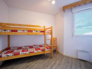 Posteľ alebo postele v izbe v ubytovaní Grand appartement 12 pers. à Peyragudes avec balcon - FR-1-695-8