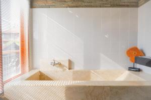 Koupelna v ubytování Nur Guest House by Purely + 37 fotografií