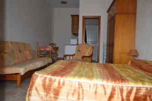 Ein Bett oder Betten in einem Zimmer der Unterkunft Casa la Ermita