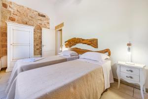 En eller flere senge i et værelse på Tenuta la Trebbia + 64 billeder