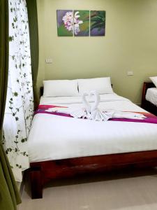 Postel nebo postele na pokoji v ubytování Villa By Areeya Phubeach resort