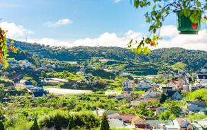 a view of a small town with houses and trees at Casa Villa - Dalat Valley View in Da Lat