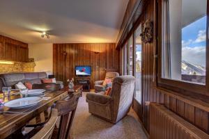 Μια τηλεόραση ή/και κέντρο ψυχαγωγίας στο Appartement LaForet 23 +20 φωτογραφίες