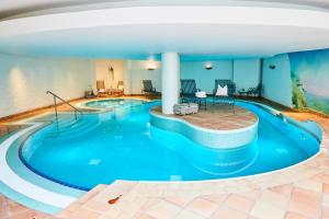 Bazén v ubytování Hotel Landhaus an de Dün nebo v jeho okolí