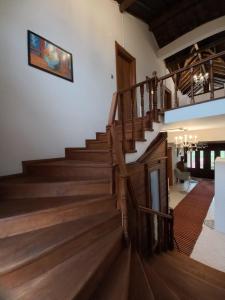 a staircase in a house with wooden floors at Hayat Oksijen Resort in Ordu