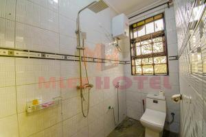 Un baño de Mlex Hotel