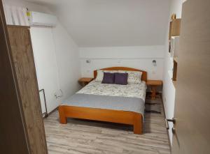 Postel nebo postele na pokoji v ubytování Apartment Andrea