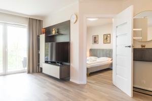 Posteľ alebo postele v izbe v ubytovaní Polanica Residence and SPA, MyWeek