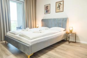 Posteľ alebo postele v izbe v ubytovaní Polanica Residence and SPA, MyWeek