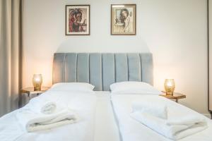Posteľ alebo postele v izbe v ubytovaní Polanica Residence and SPA, MyWeek