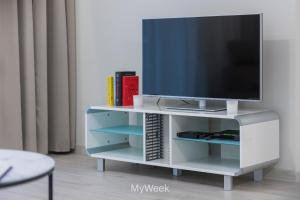 Televízia a/alebo spoločenská miestnosť v ubytovaní Polanica Residence and SPA, MyWeek