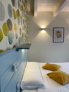 Letto o letti in una camera di L'ALBEROCASA