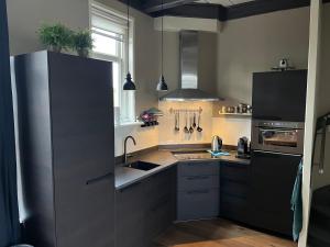 Imagen de la galería de Huis in het centrum aan de Jachthaven, en Harlingen