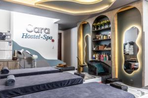 Postel nebo postele na pokoji v ubytování Cara Hostel & Spa