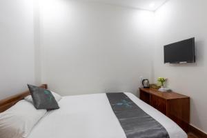 Postel nebo postele na pokoji v ubytování Cara Hostel & Spa