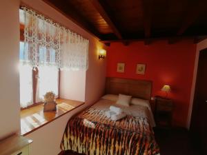 Postel nebo postele na pokoji v ubytování casa rural Dera Hont + 8 fotografií