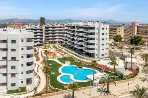 The swimming pool at or close to NEW GROUNDFLOOR APT. ARENALES DEL SOL