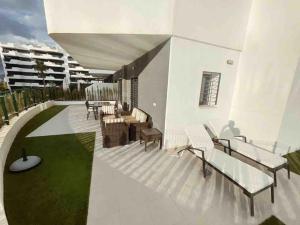 A balcony or terrace at NEW GROUNDFLOOR APT. ARENALES DEL SOL