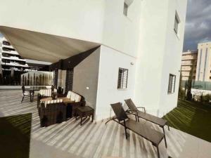 A balcony or terrace at NEW GROUNDFLOOR APT. ARENALES DEL SOL